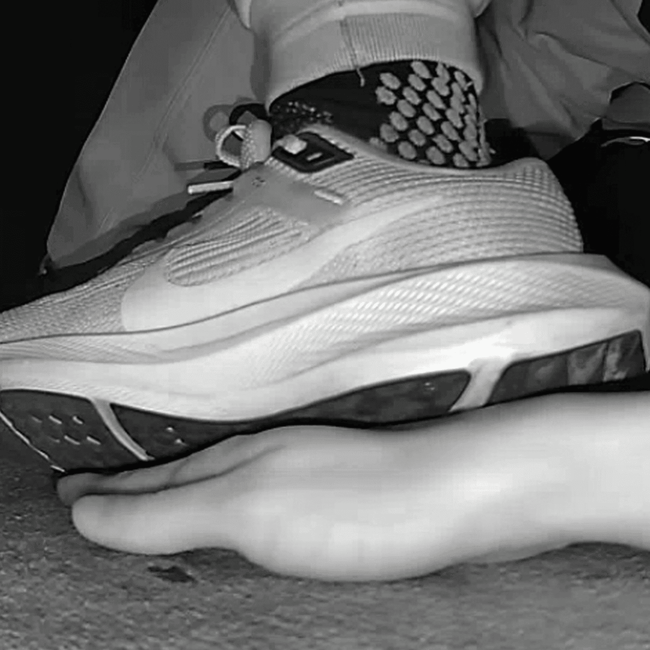Cinema young girl candid hand trample with Nike running shoes