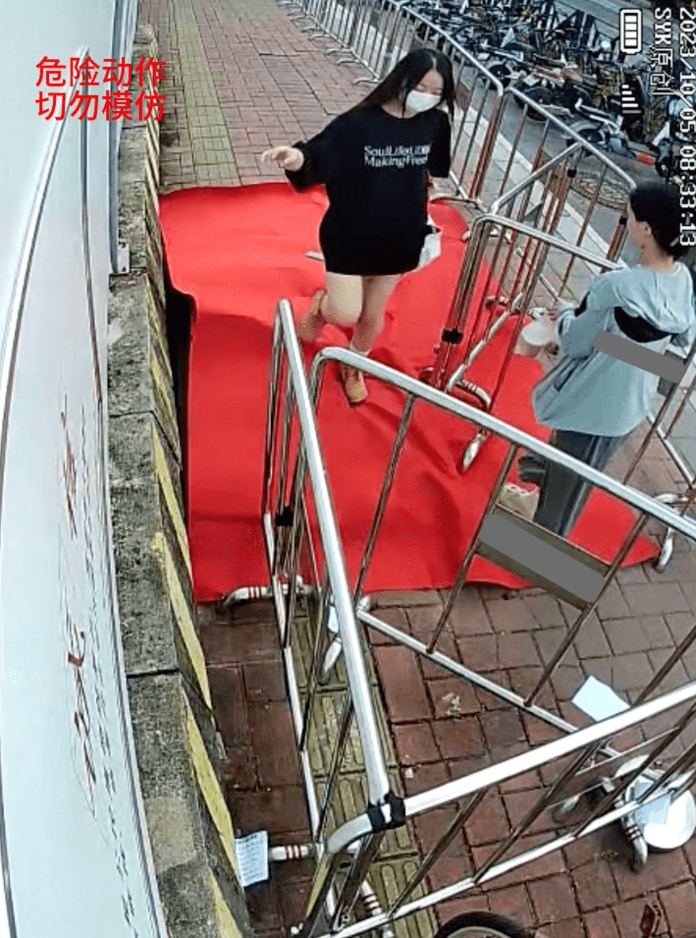 Outdoor human carpet trampled by girls (all girls) on the street