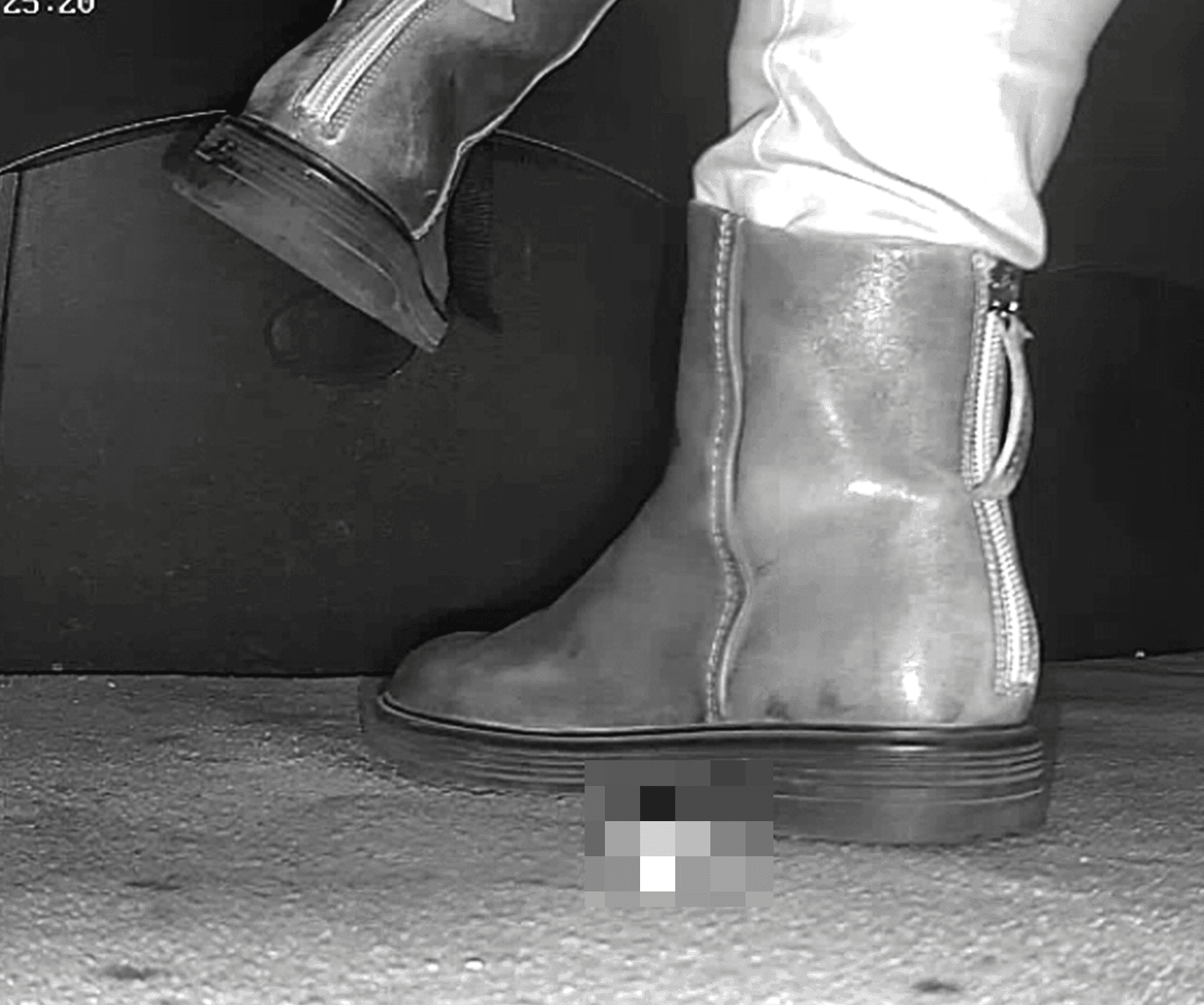 Woman in ankle boots candid crush in the cinema