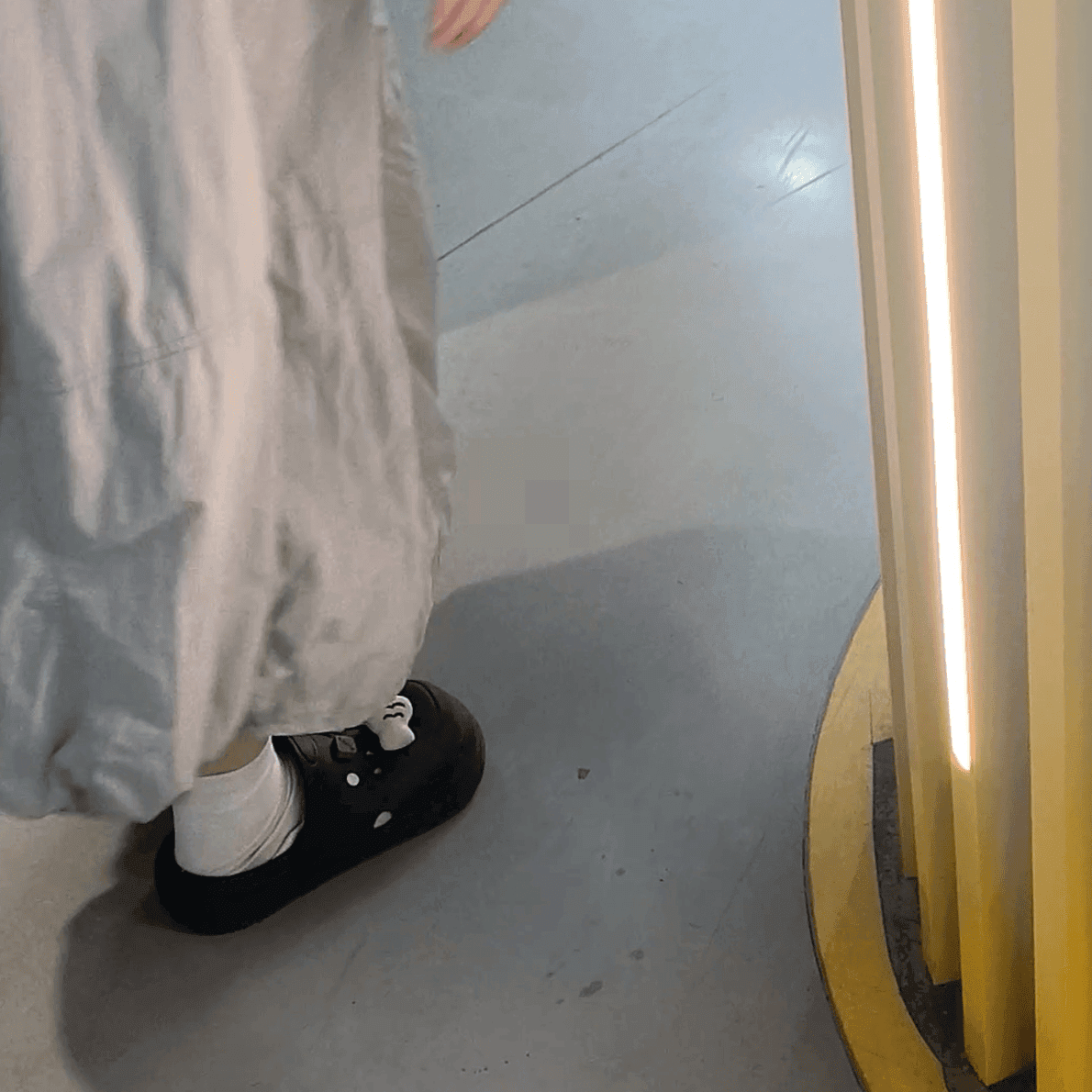 Woman passing by the clothing store entrance and the women's restroom doorway candid crush