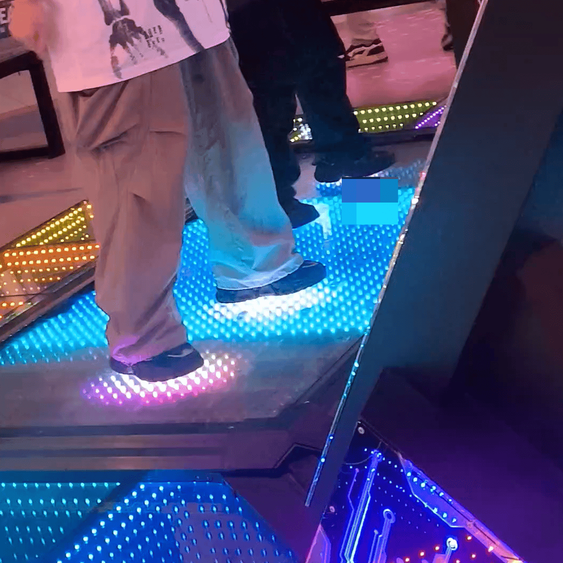 Two ladies in black sneakers candid crush on the dance machine