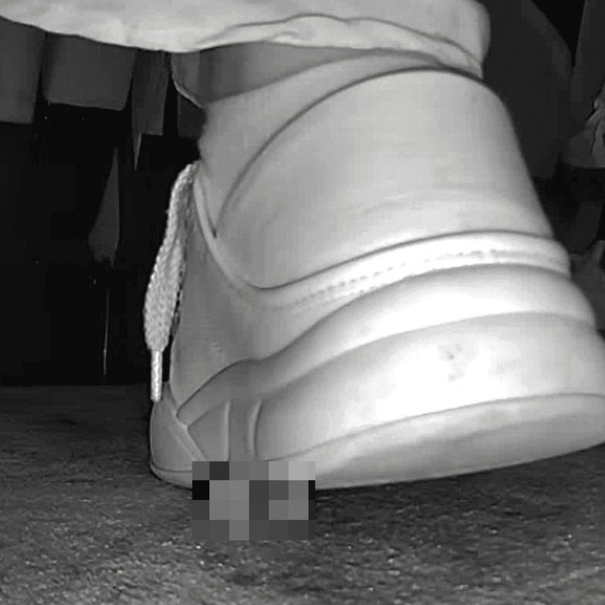Woman in skirt and white sneakers candid crush in the cinema