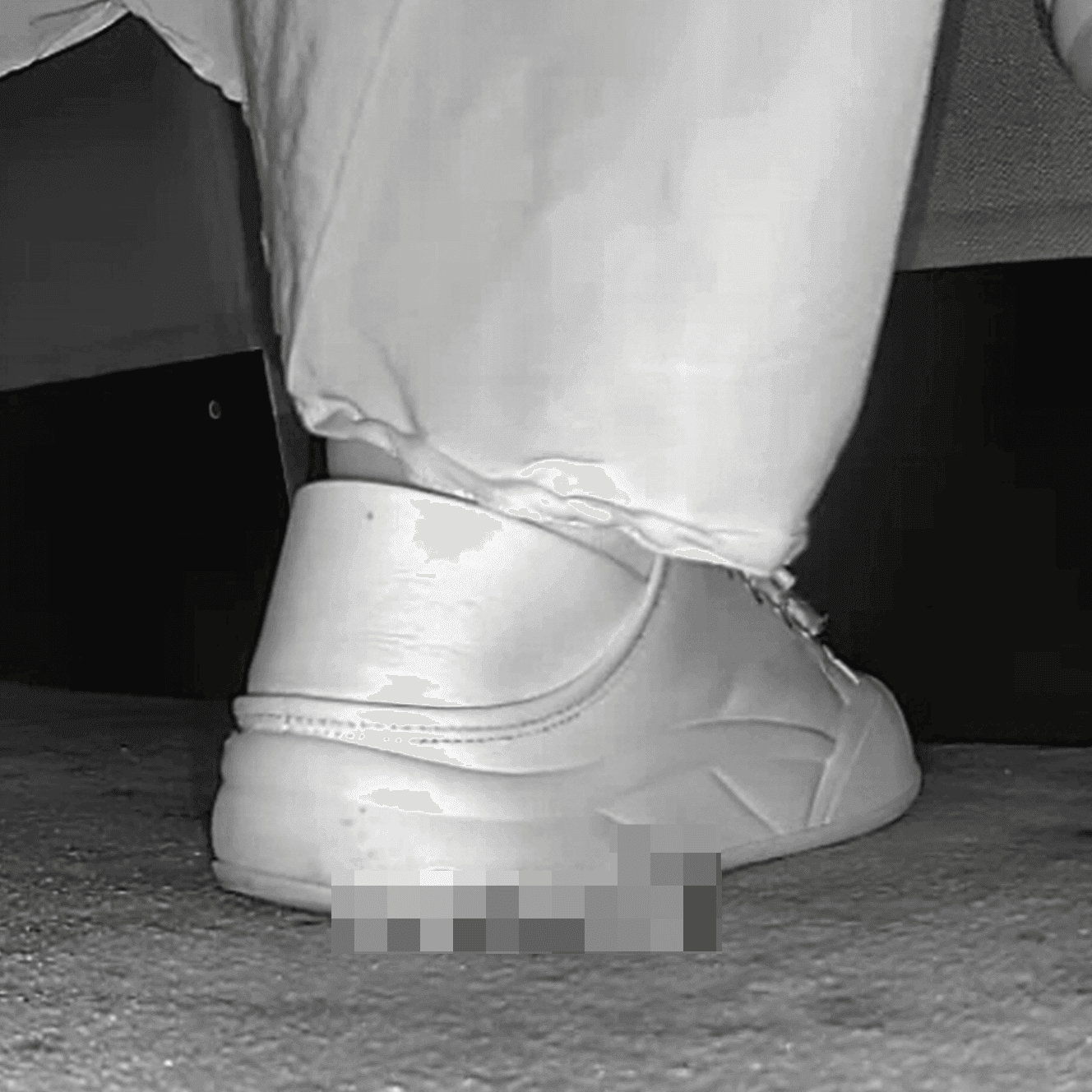 Woman in skirt and white sneakers candid crush in the cinema