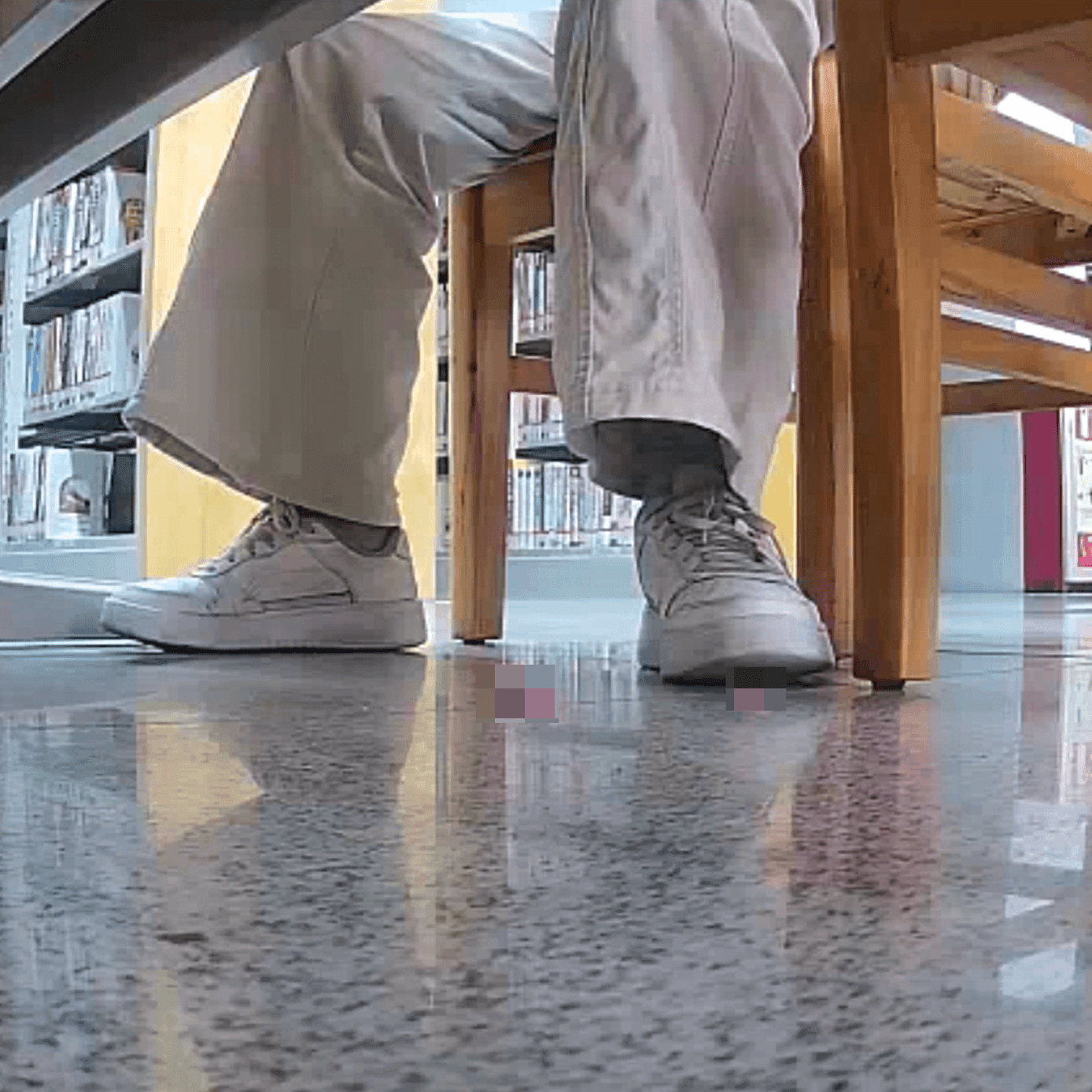 Woman candid crush with white sneakers at the library