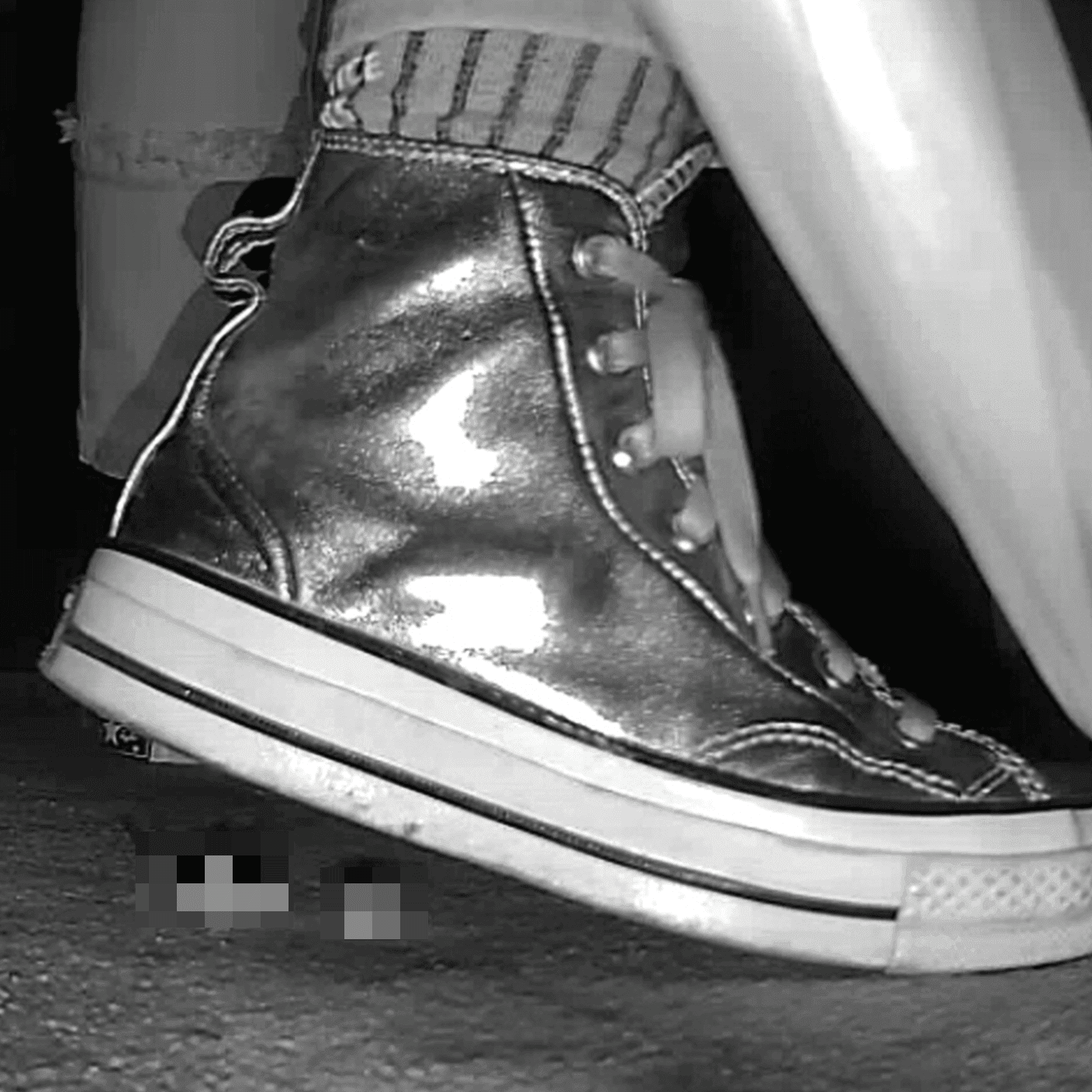 Woman in silver Converse candid crush at the cinema