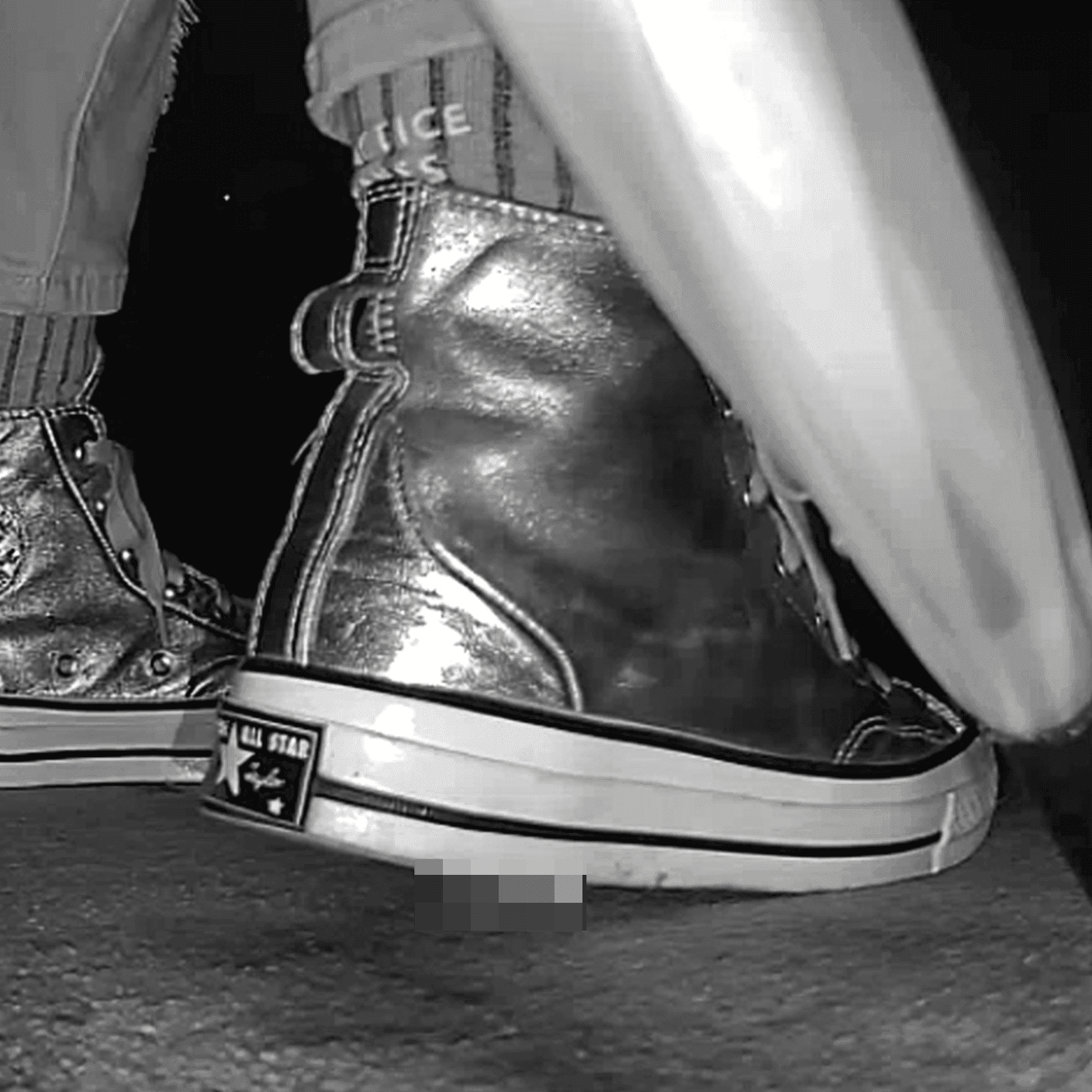 Woman in silver Converse candid crush at the cinema