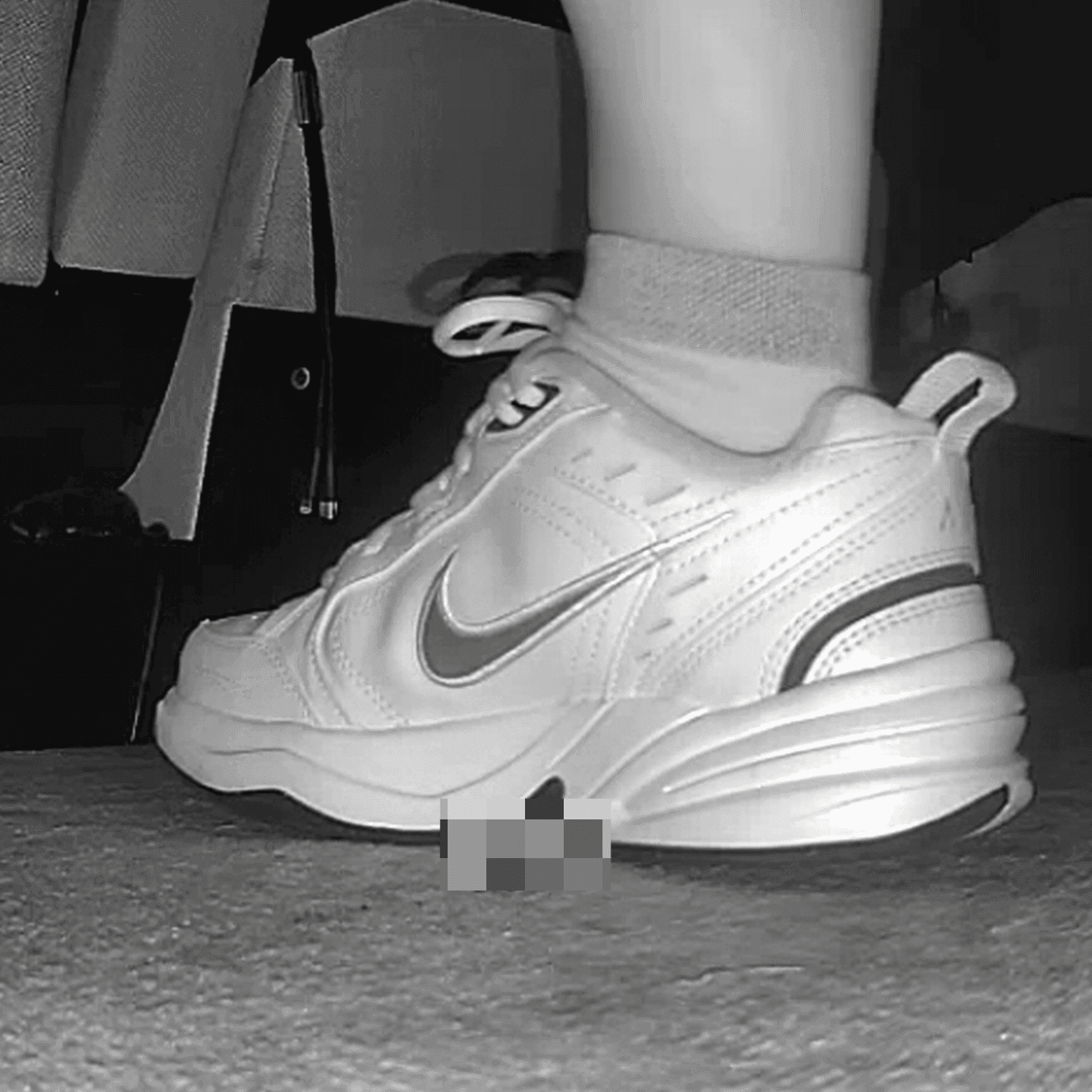 Woman in Nike Air sneakers candid crush at the cinema