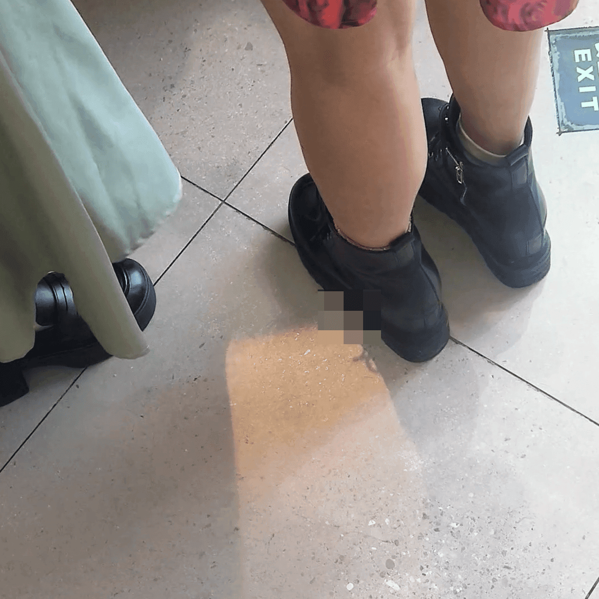 Game arcade woman candid crush with chunky heeled leather shoes and Martin boots
