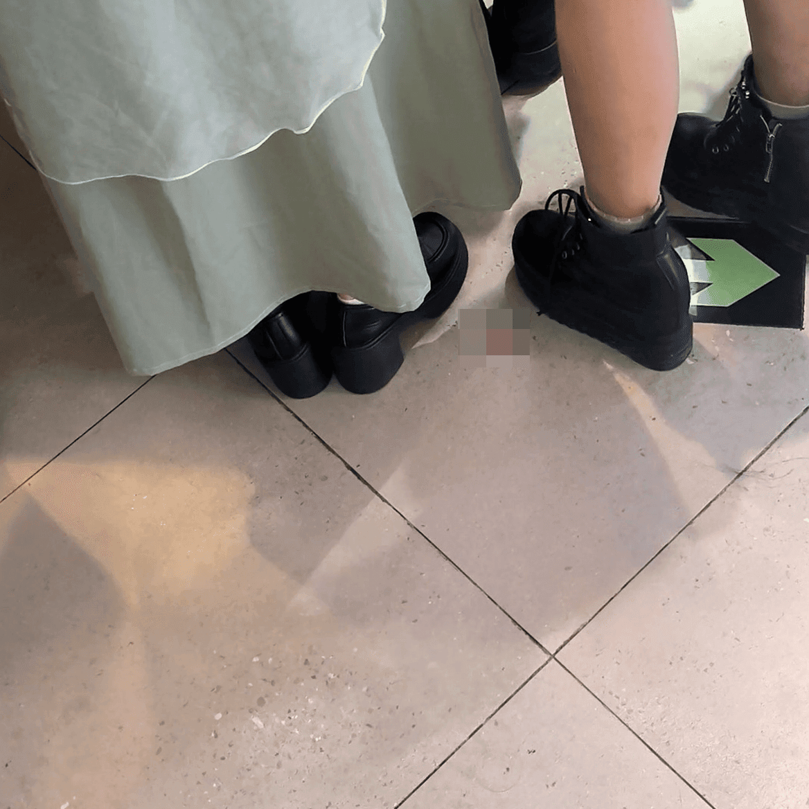 Game arcade woman candid crush with chunky heeled leather shoes and Martin boots