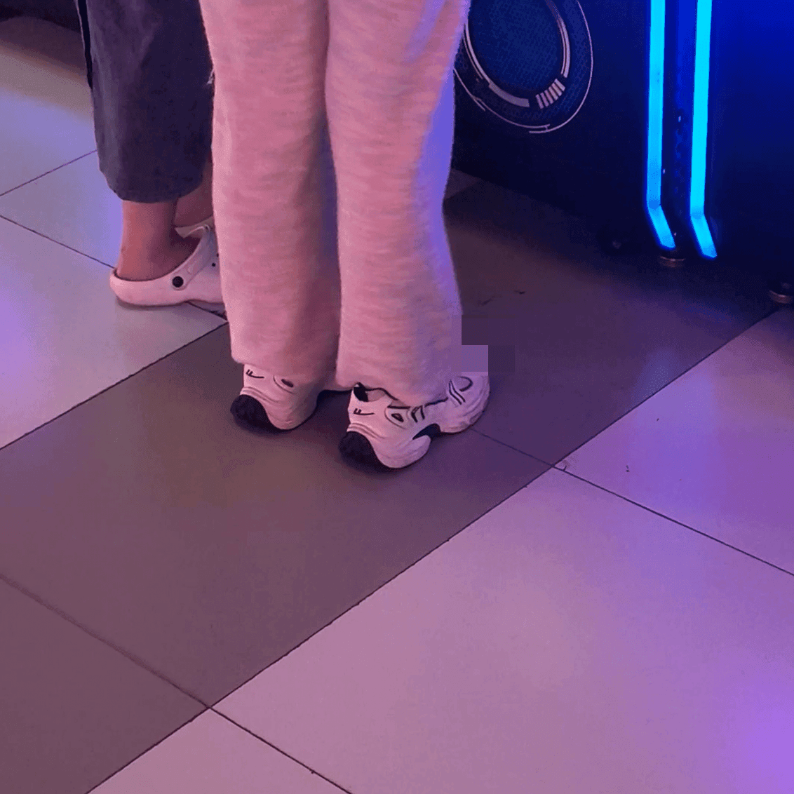 Game arcade dance machine and basketball shooting game woman candid crush with sneakers
