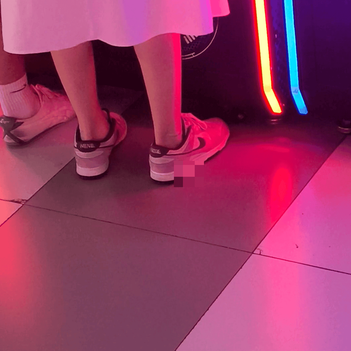 Game arcade dance machine and basketball shooting game woman candid crush with sneakers