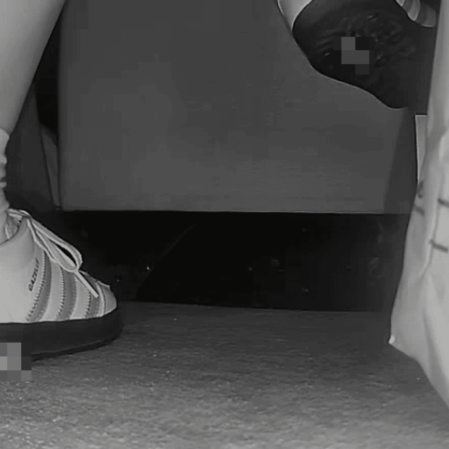 Woman in cinema candid crush with Adidas Samba sneakers