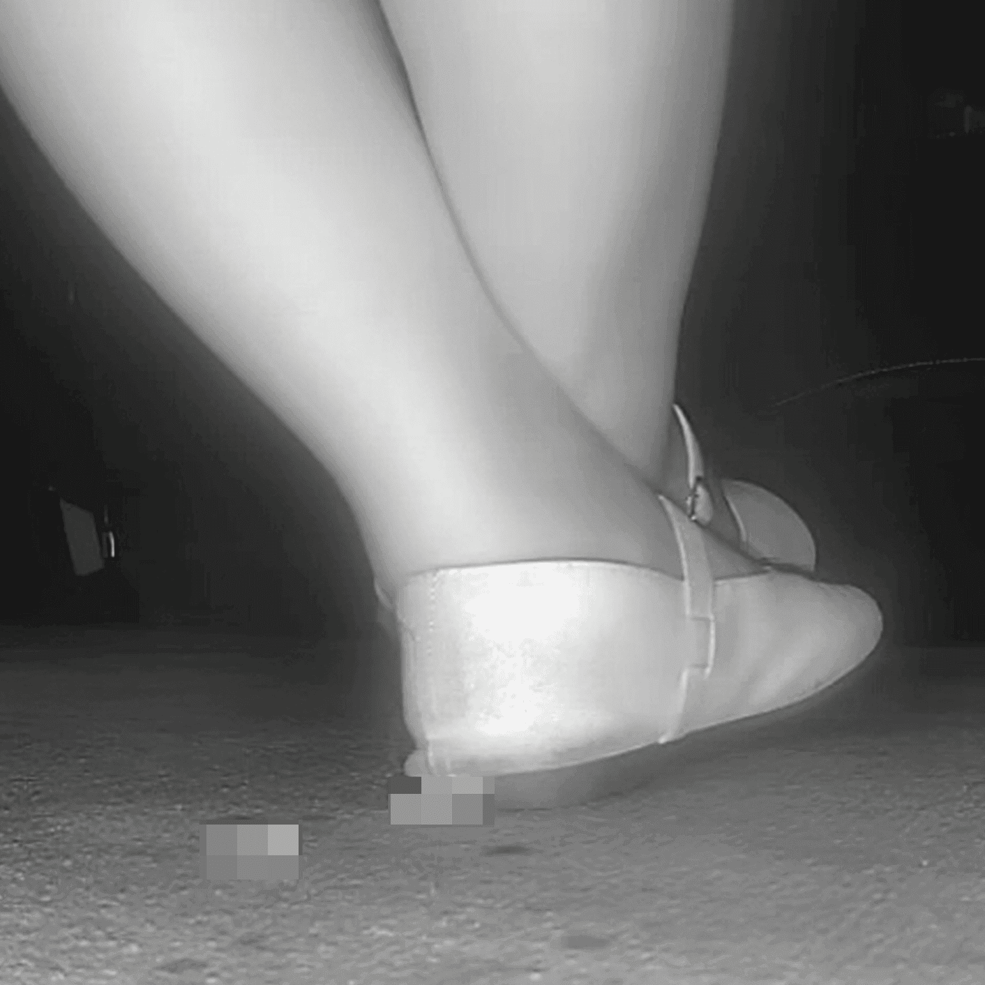 Woman candid crush with flat shoes at the cinema
