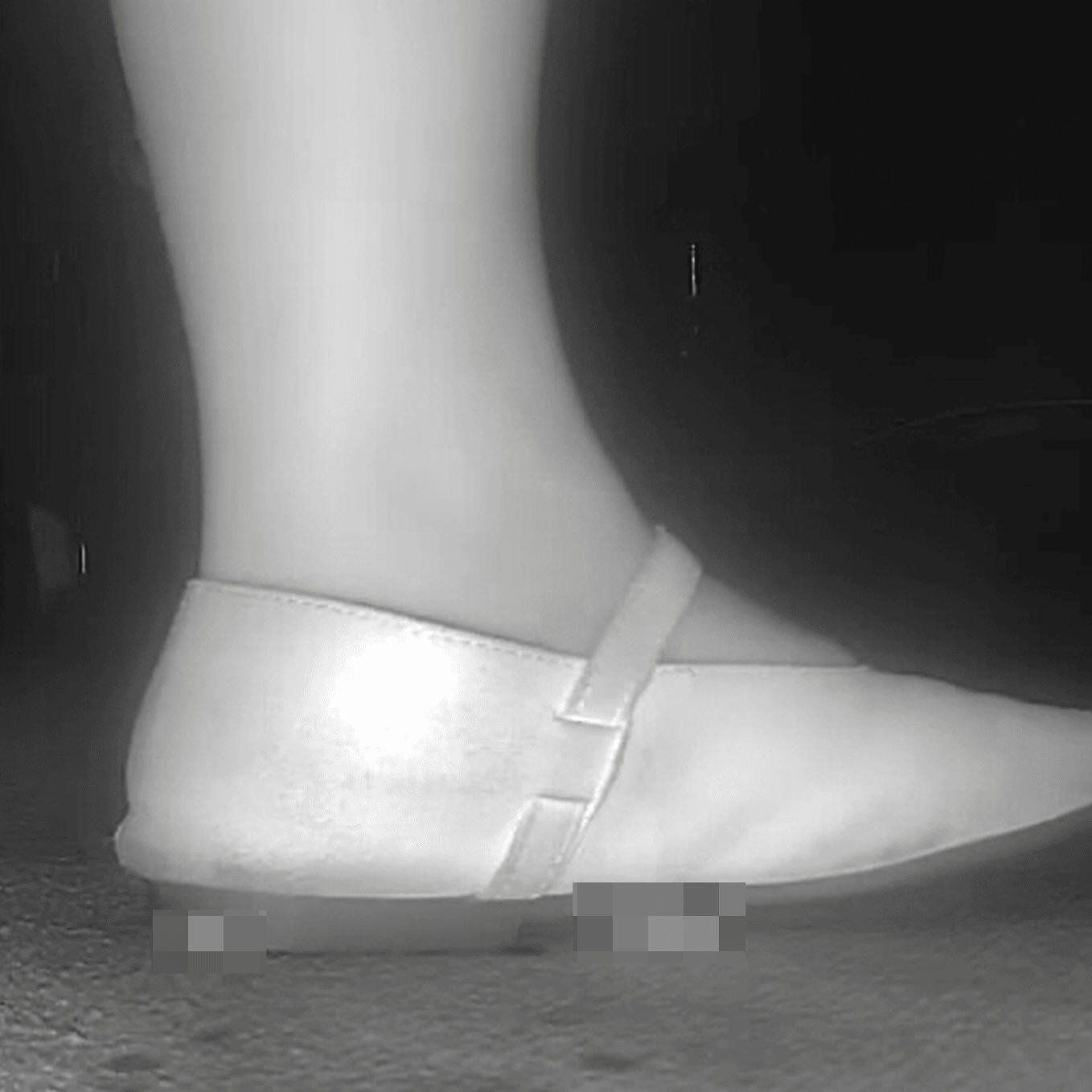 Woman candid crush with flat shoes at the cinema