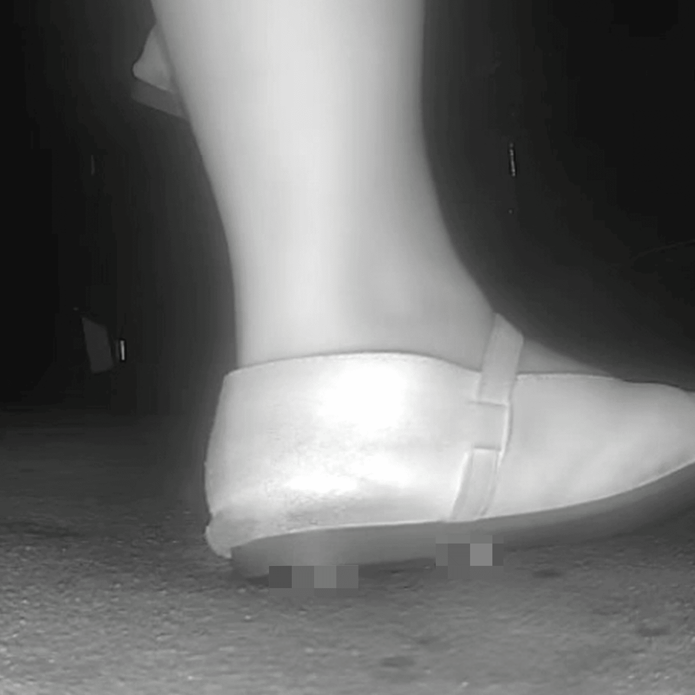 Woman candid crush with flat shoes at the cinema
