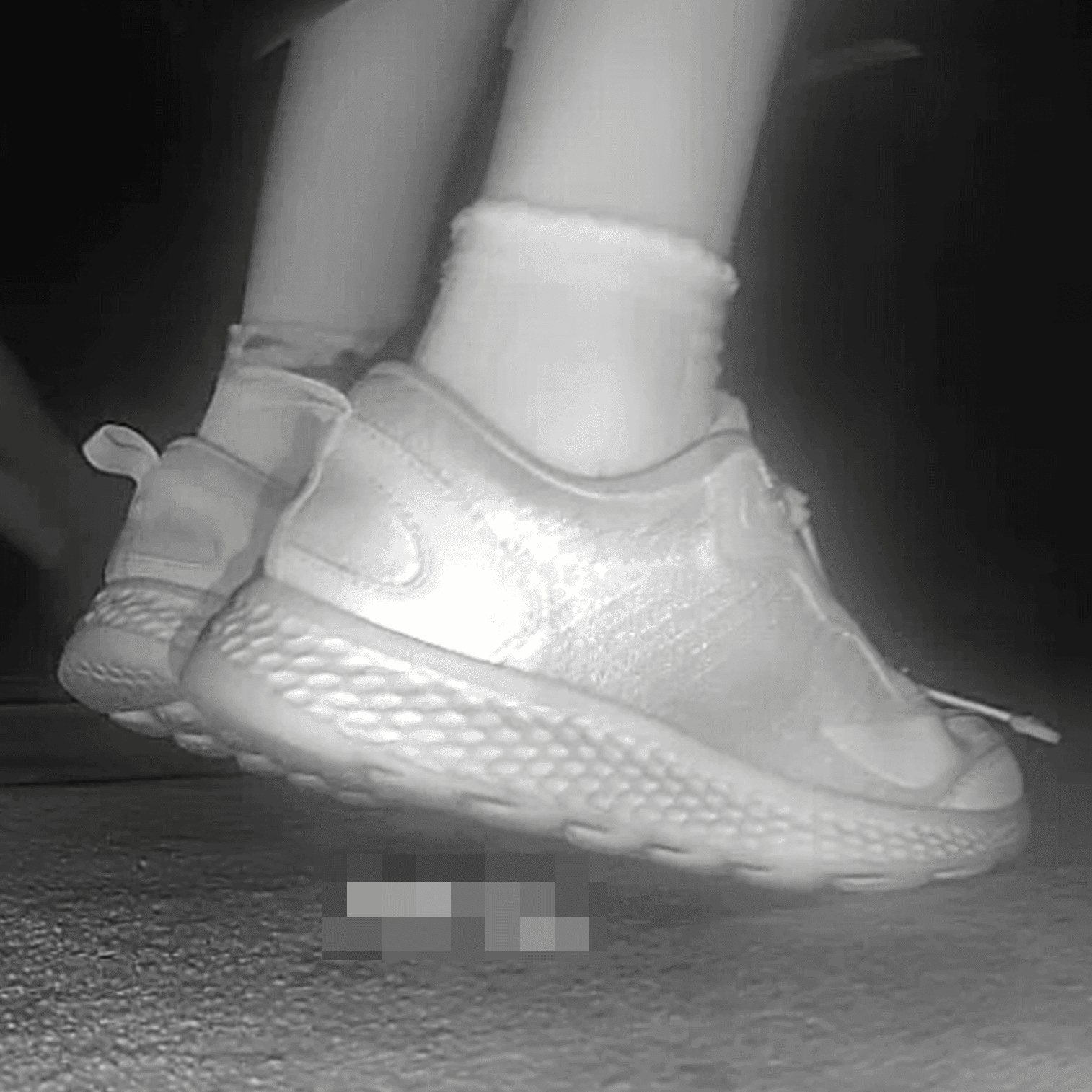 Young lady in sneakers candid crush at the cinema
