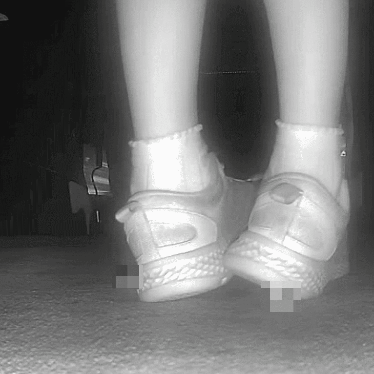 Young lady in sneakers candid crush at the cinema