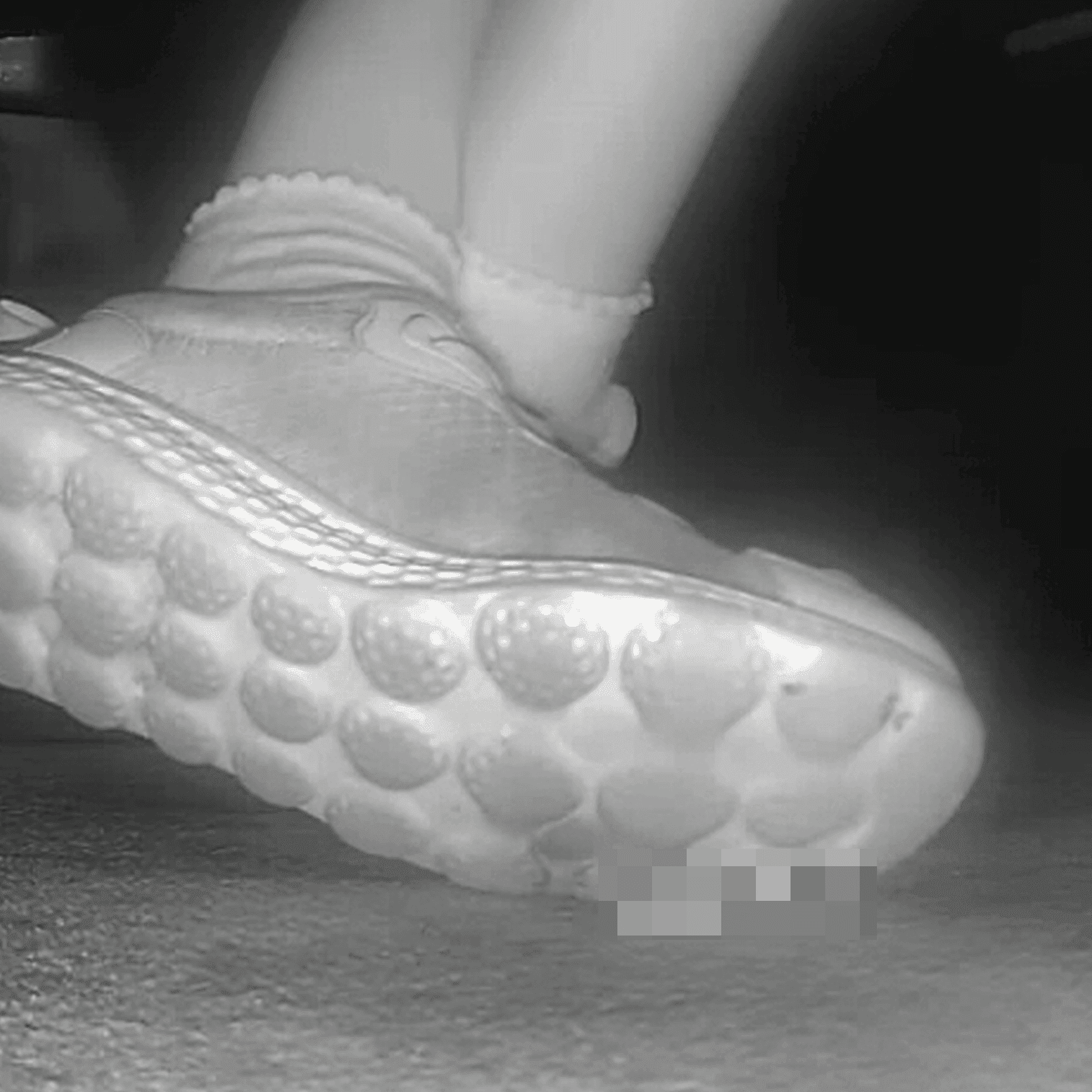 Young lady in sneakers candid crush at the cinema