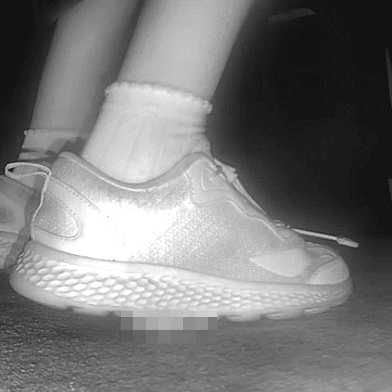 Young lady in sneakers candid crush at the cinema