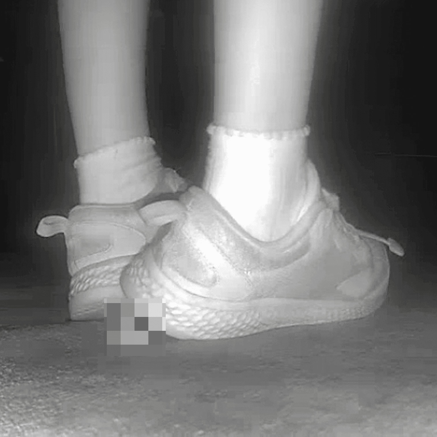 Young lady in sneakers candid crush at the cinema